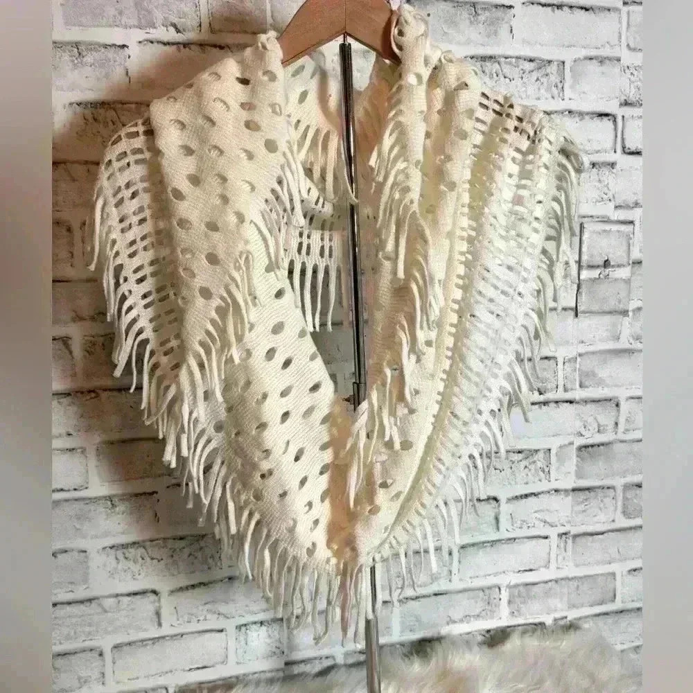 Cream colored infinity scarf with cutouts and fringe excellent new‎ condition